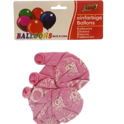 Pink balloons with white patterns in packaging on a white background
