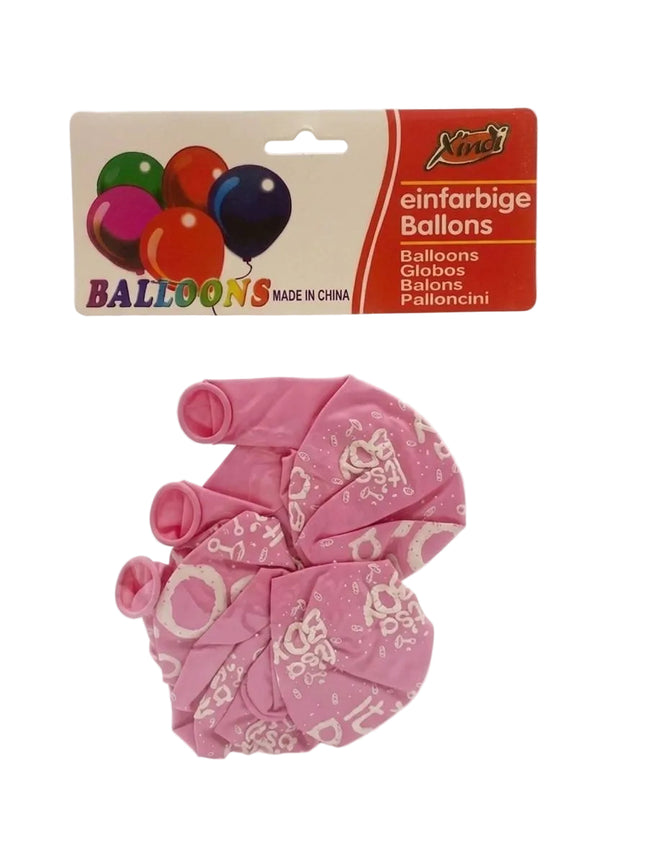 Pink balloons with white patterns in packaging on a white background