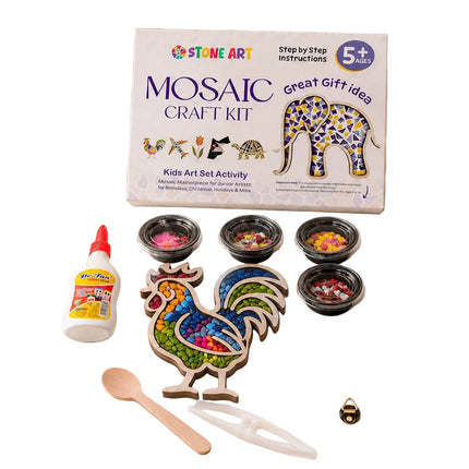 Stone Art Mosaic Craft Kit shown with its box and included materials on a light surface. The kit includes a mosaic rooster, small bowls of colorful powder, a bottle of glue, a wooden spoon, a yellow pom-pom, and a small wooden tool.